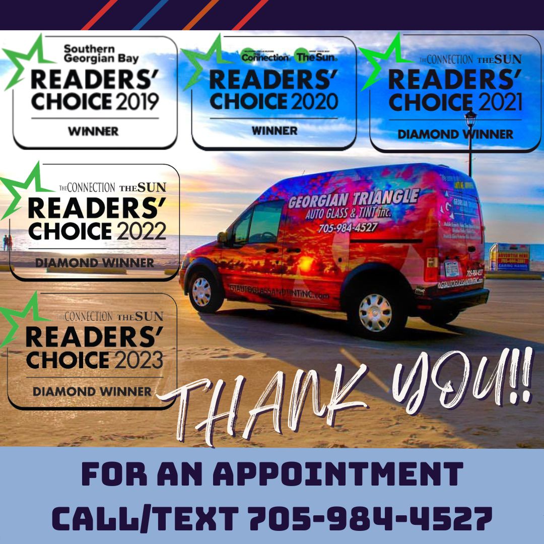 Picture of Georgian Triangle Auto Glass and Tint's company van at Beach 1 with a thank you for the Reader's Choice Award winds four years in a row
